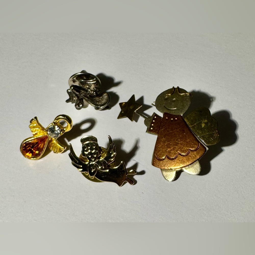 4 each angel pins.